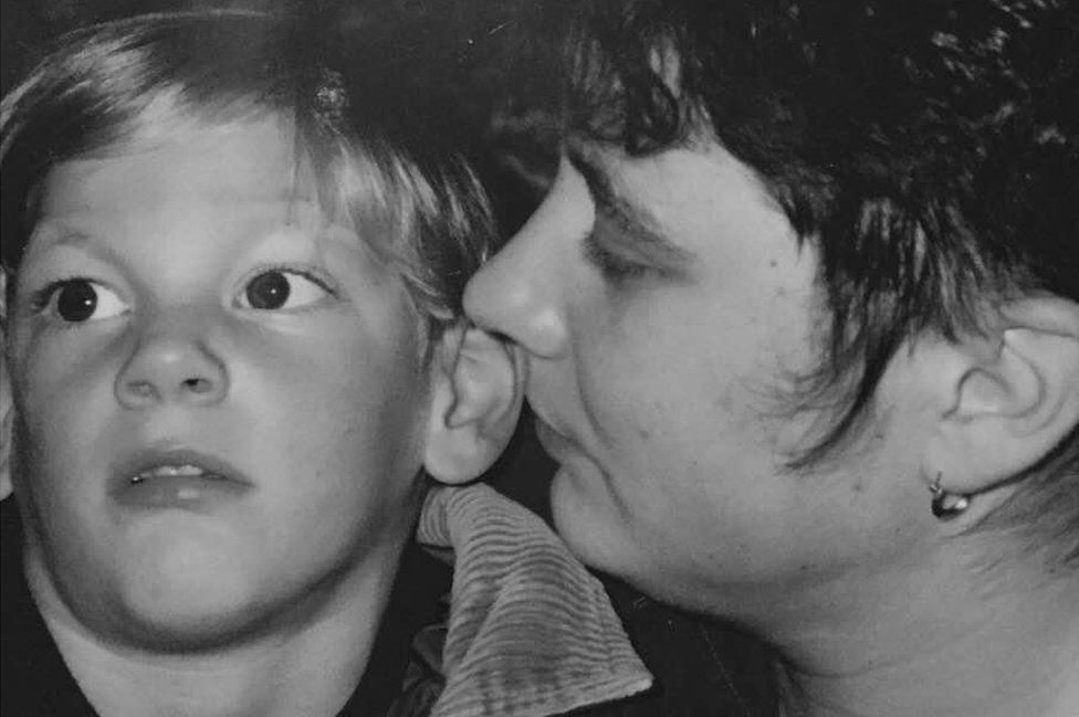 Martin Wells as a boy with his mum Chris in black and white