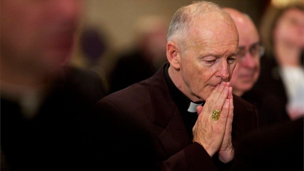 Archbishop of Washington Cardinal Theodore McCarrick praying