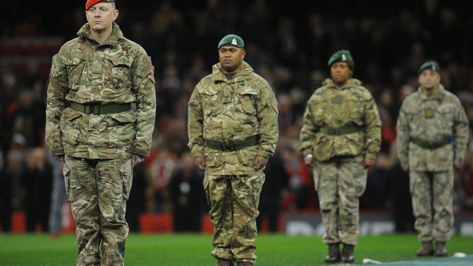 soldiers on pitch of Principality Stadium