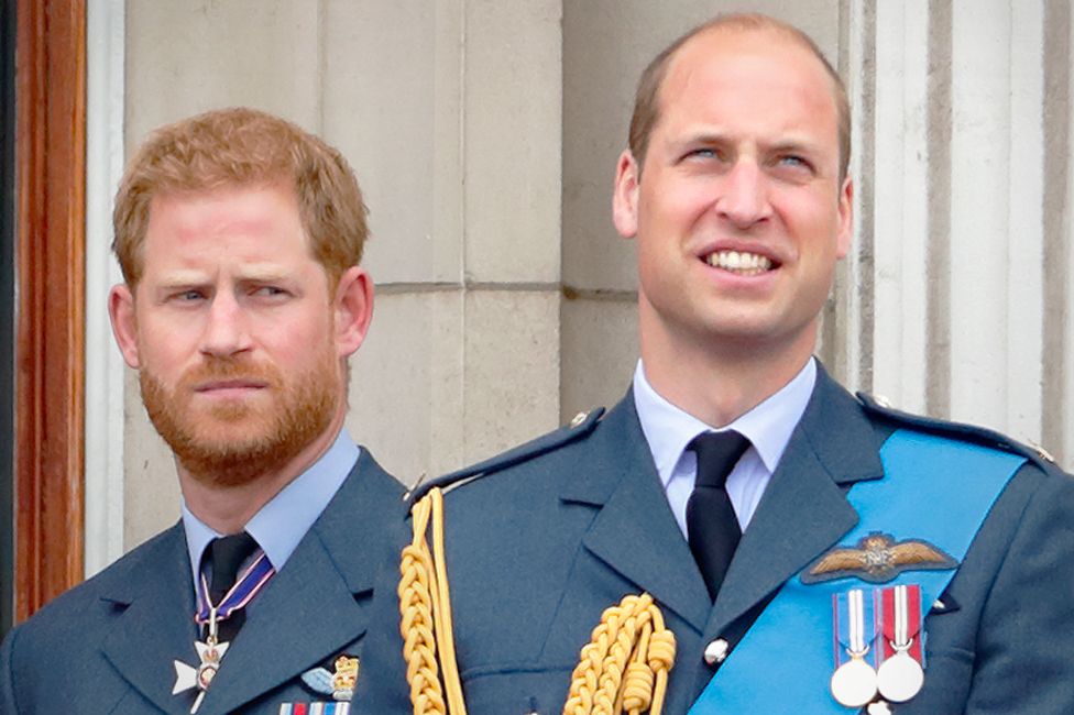 Princes Harry and William watch a flypast to mark the centenary of the RAF, 2018