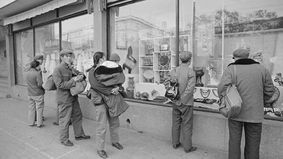 Chinese people in front of a shop window, November 1978