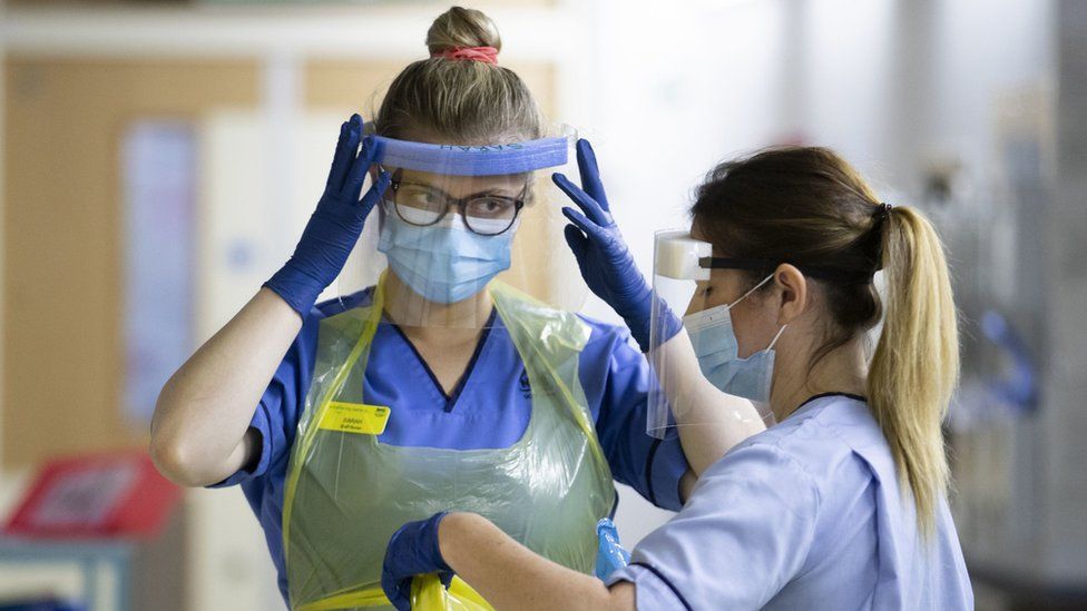 NHS staff wearing protective equipment