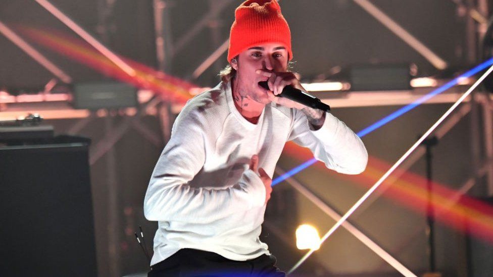 Justin Bieber performing.