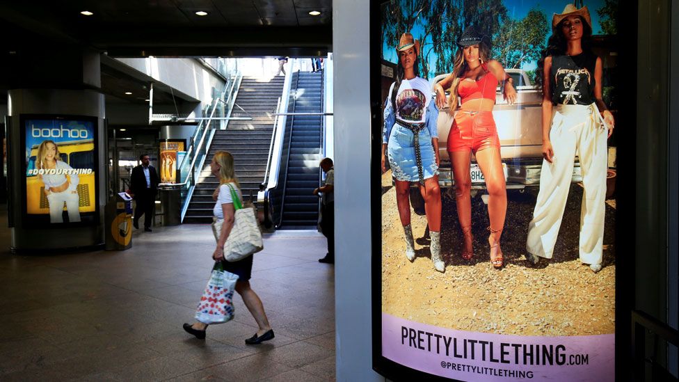Billboards advertising Boohoo and Pretty Little Thing