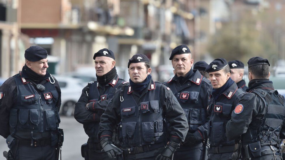 A group of Italian carabinieri patrol on November 28, 2017
