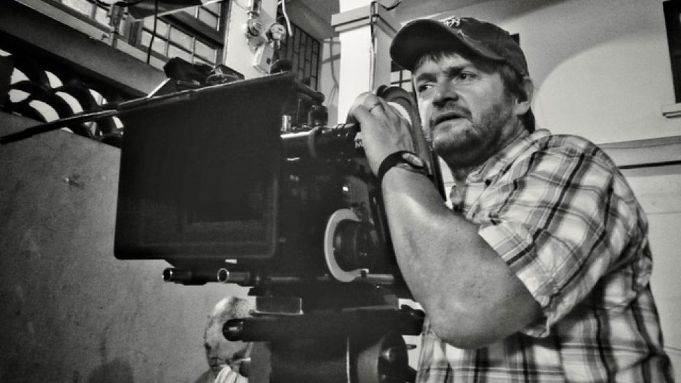 Mark Milsome on set with a camera