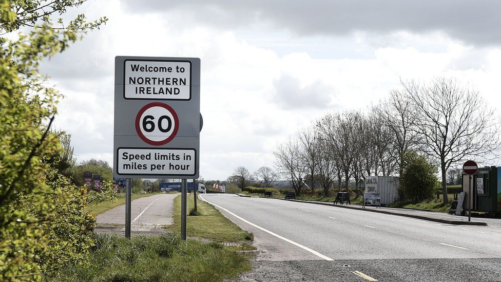 A road sign on the Irish border.