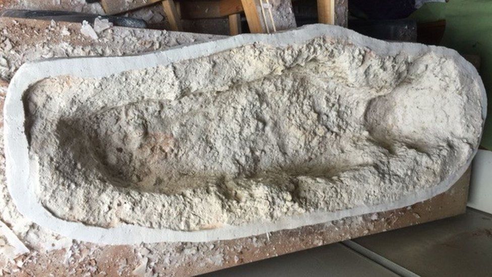 Mould of a child's grave