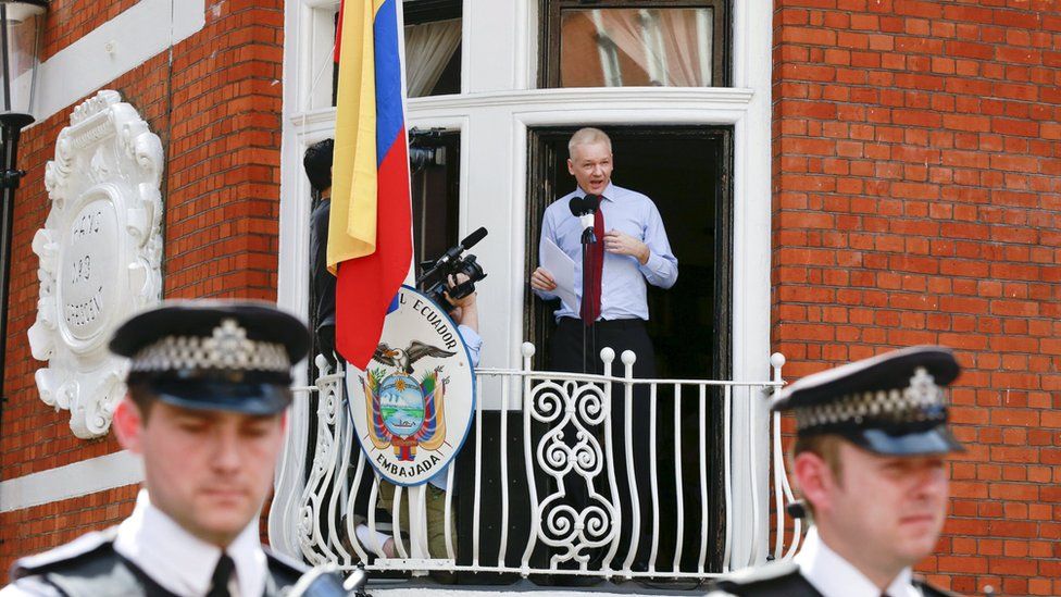 Julian Assange speaking to the media outside the Ecuadorian embassy in 2012