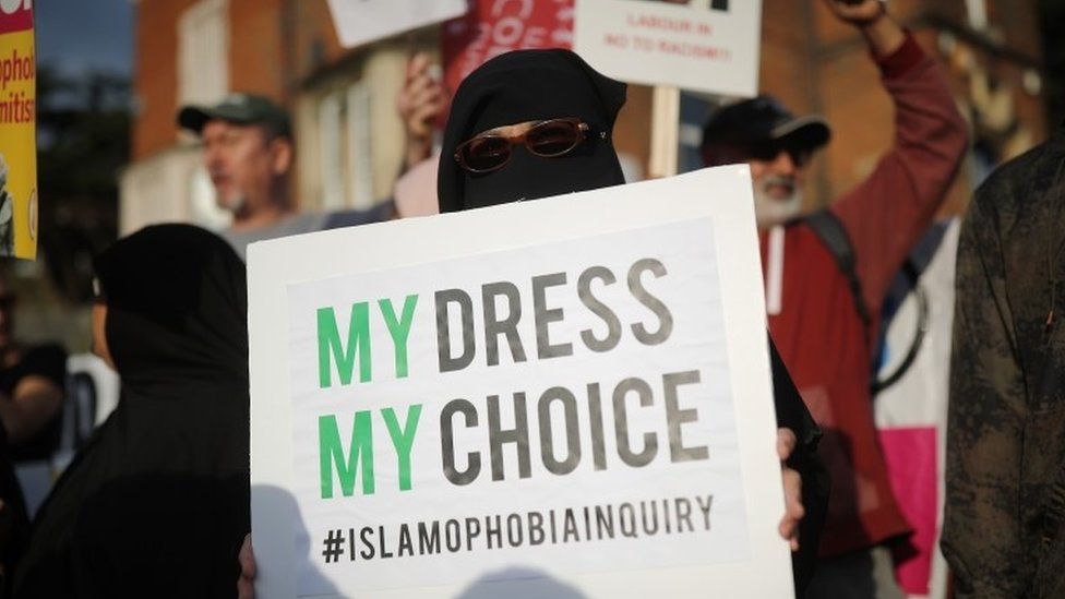 Local people protest outside the Hillingdon Conservative Association office on August 9, 2018 in Uxbridge, England.