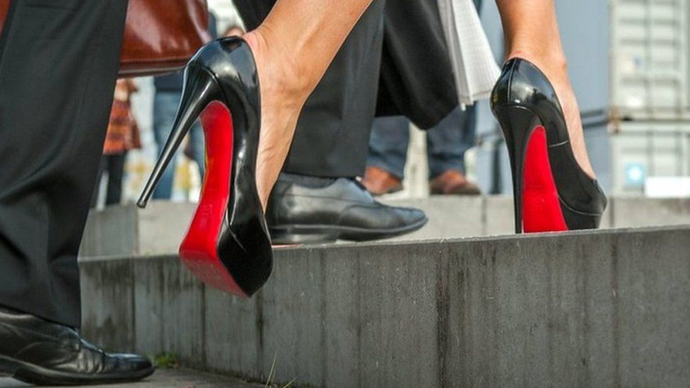 black heels with red soles