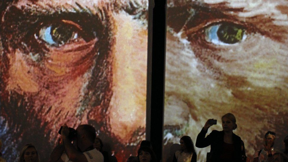 Visitors at the multimedia exhibition "Van Gogh Alive - The Experience" in Krakow