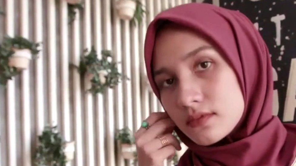 A hijabi fashion influencer