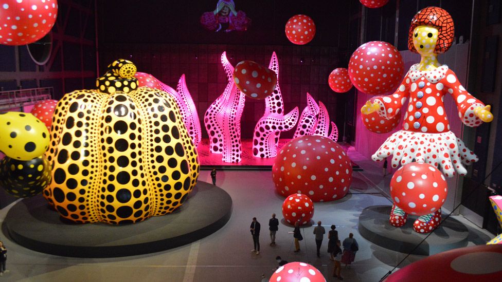 Yayoi Kusama inflatable polka dot sculptures at Aviva Studios in Manchester