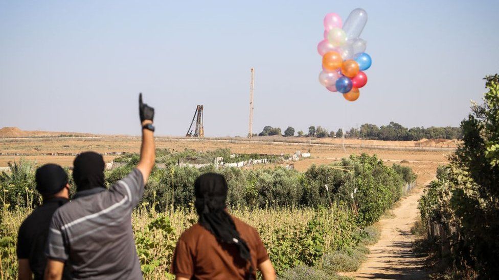 Palestinians release balloons with incendiary devices attached into Israel - pictured 25th August 2020