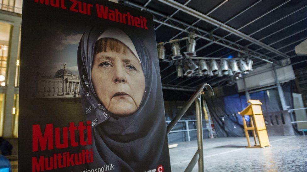 A picture of Chancellor Angela Merkel at a meeting of Legida, the local Leipzig movement inspired by Pegida, January 201