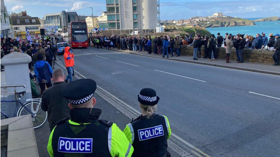 Protesters and counter-protesters gather outside Newquay hotel