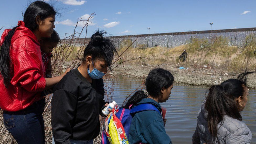 Migrants at the Mexico-Texas border on 7 March