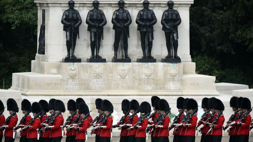 Guardsmen passed a memorial to members of the Household Division killed in service since 1918