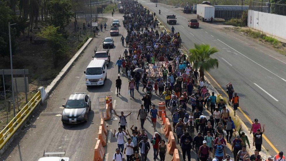 Migrants take part in a caravan towards Mexico City called 'The Migrant's Via Crucis' in memory of 40 migrants who died in a fire at a migrant detention centre in the border city of Ciudad Juarez, April 23, 2023.