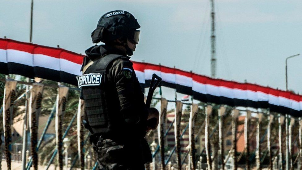 An Egyptian policeman standing guard in the new city of el-Alamien, west of Alexandria
