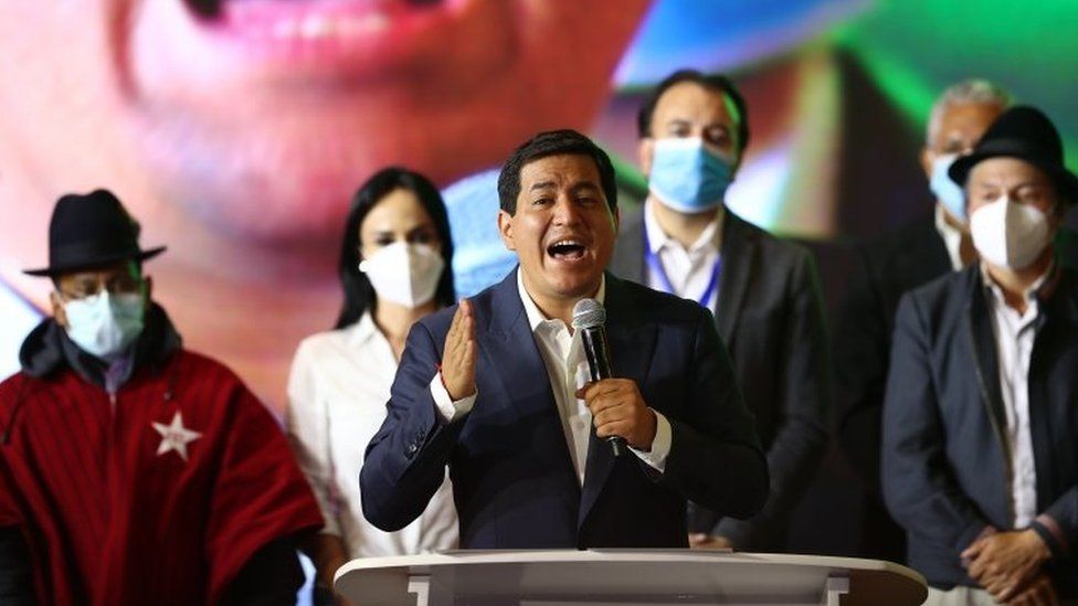 Andres Arauz (C) gives a concession speech to his supporters in Quito, Ecuador, 11 April 2021.
