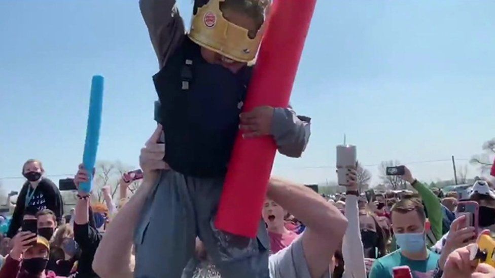 A four-year-old nicknamed 'Little Josh' is hoisted into the air