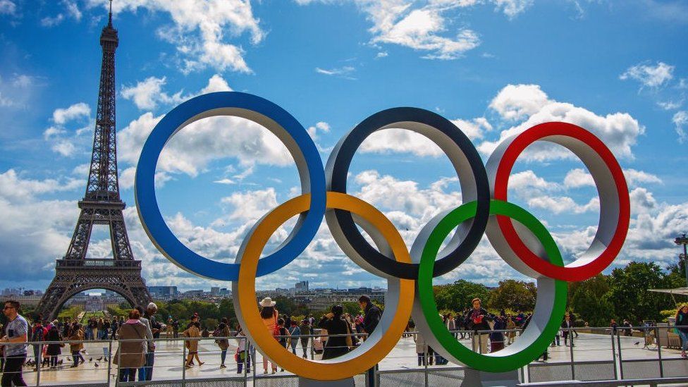 The Olympic Rings in front of the Eiffel Tower in Paris