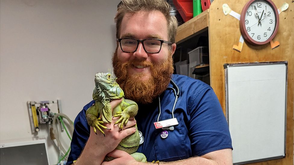 Dr Matt Guy holding a reptile