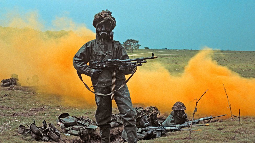 BRITISH ARMY TESTING CHEMICAL WARFARE SUITS AT PORTON DOWN ENGLAND