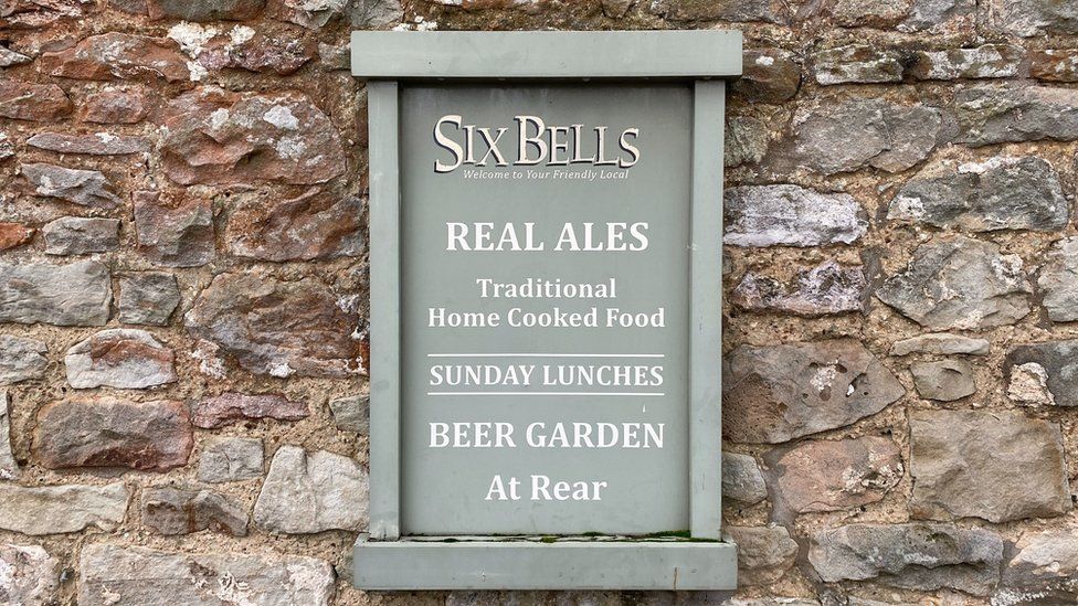 Six Bells pub sign