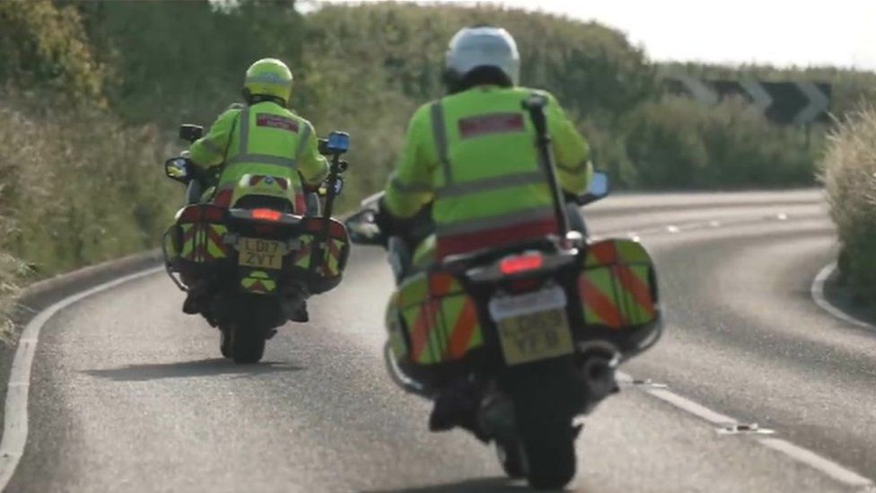 DocBikes on the road with bikers wearing high-vis coats