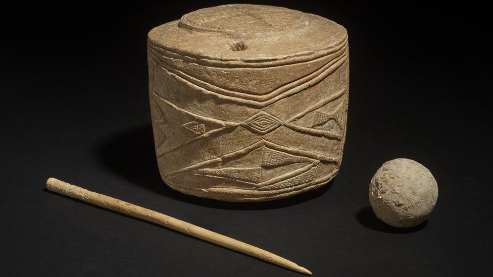 Chalk drum with bone and ball