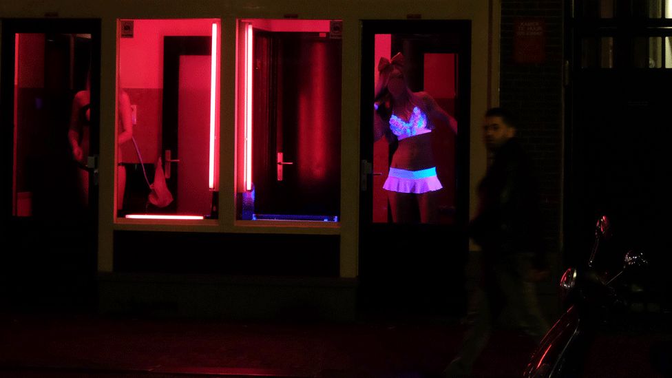 Prostitutes in Amsterdam's De Wallen red light zone