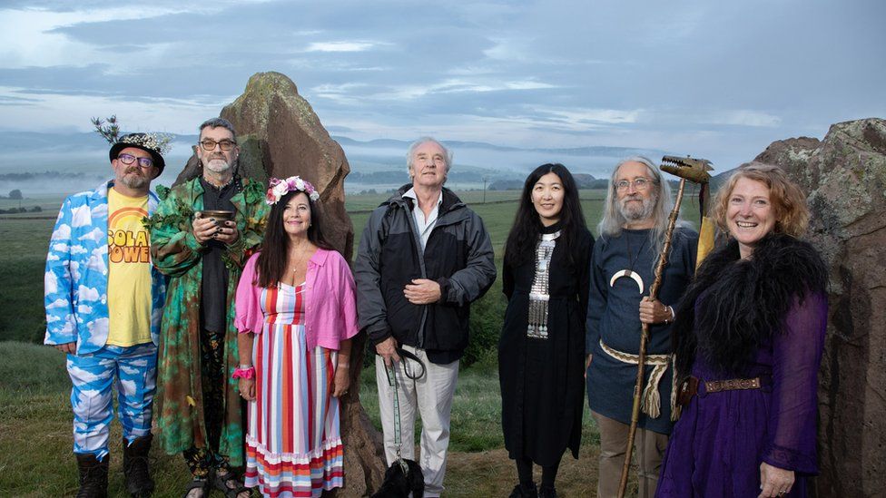People who took part in sunrise ceremony at Crawick Multiverse