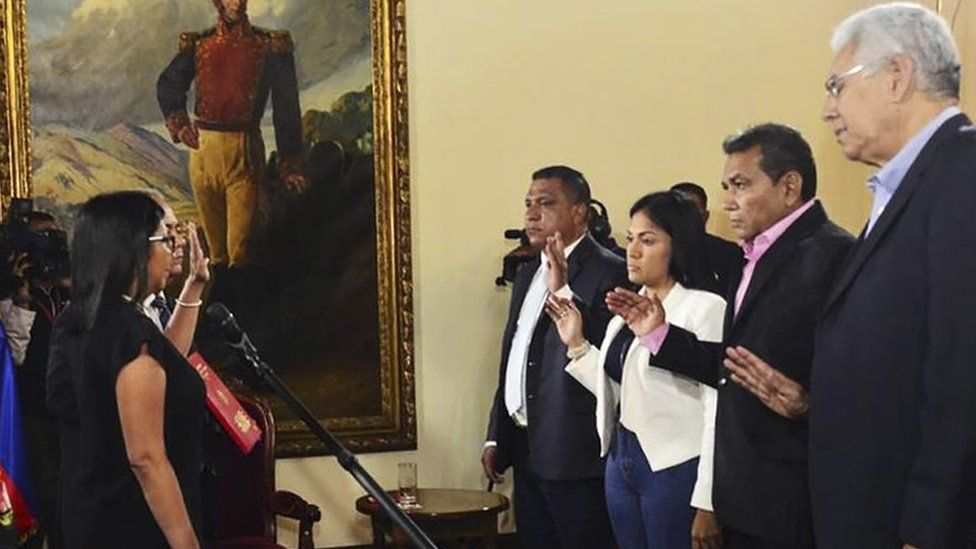 Venezuelan Constituent Assembly President Delcy Rodriguez (left) swears in four opposition governors in Caracas, 23 October 2017