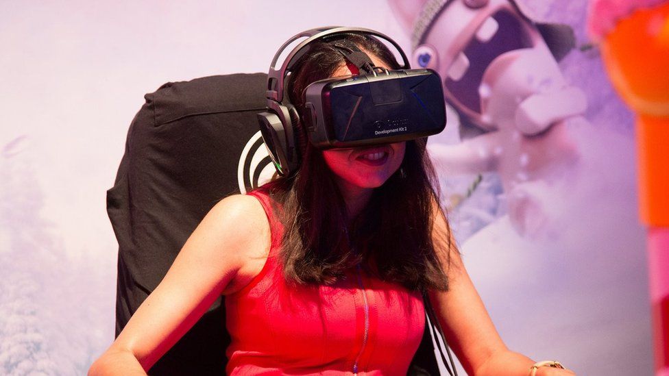 Gamer using VR headset