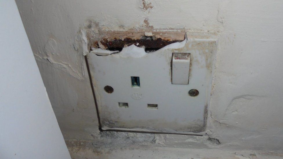 A corroded plug socket