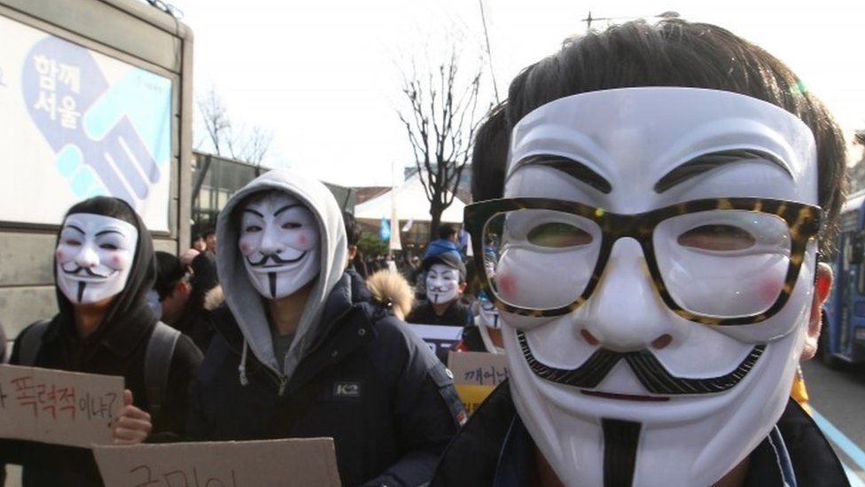 South Korean protesters attend an anti-government rally in downtown Seoul (05 December 2015)