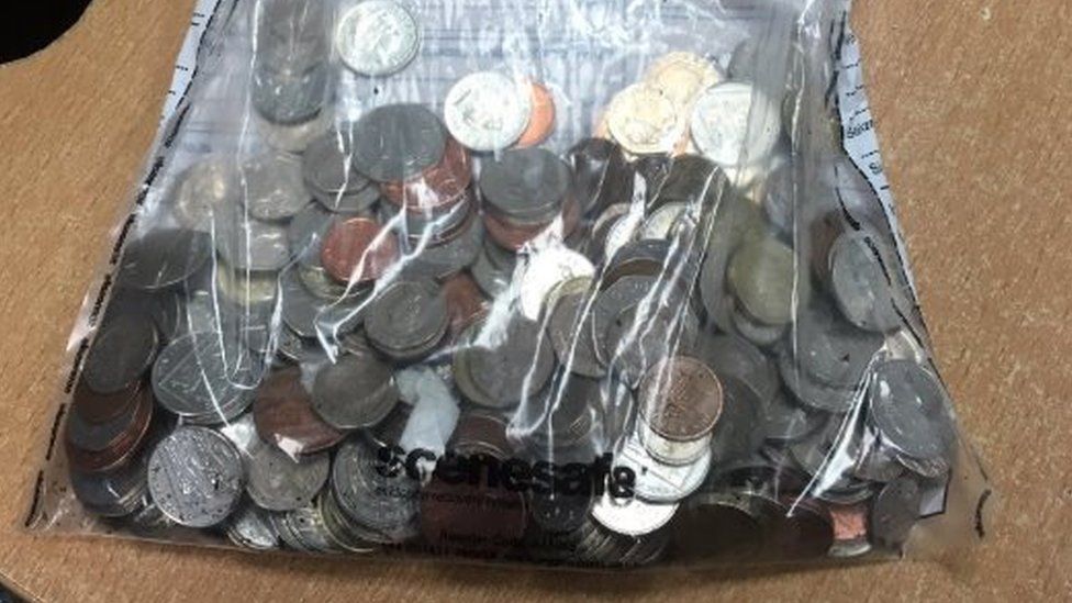 Bag of retrieved coins