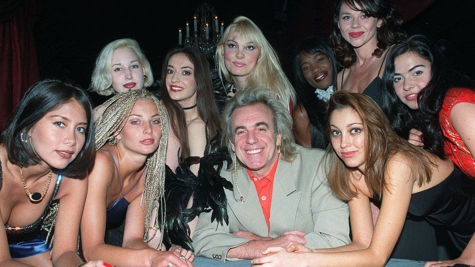 File photo dated June 22 1996 showing nightclub owner Peter Stringfellow with some of the women he has been auditioning for his new tableside dancing club, Cabaret of Angels