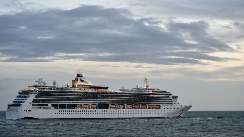 Serenade of the Sea, a huge cruise ship, pictured on the sea.