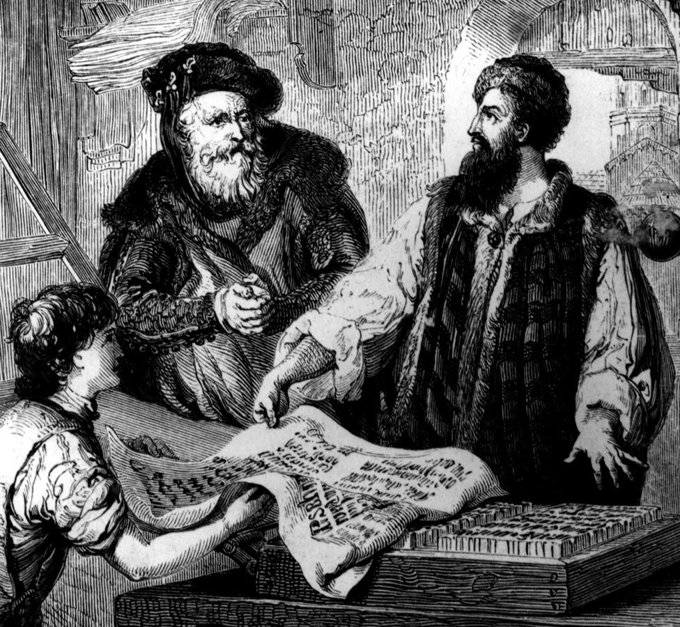 Johannes Gutenberg with his partner Johann Fust examine the first proof from moveable types on the press they set up together, circa 1455.