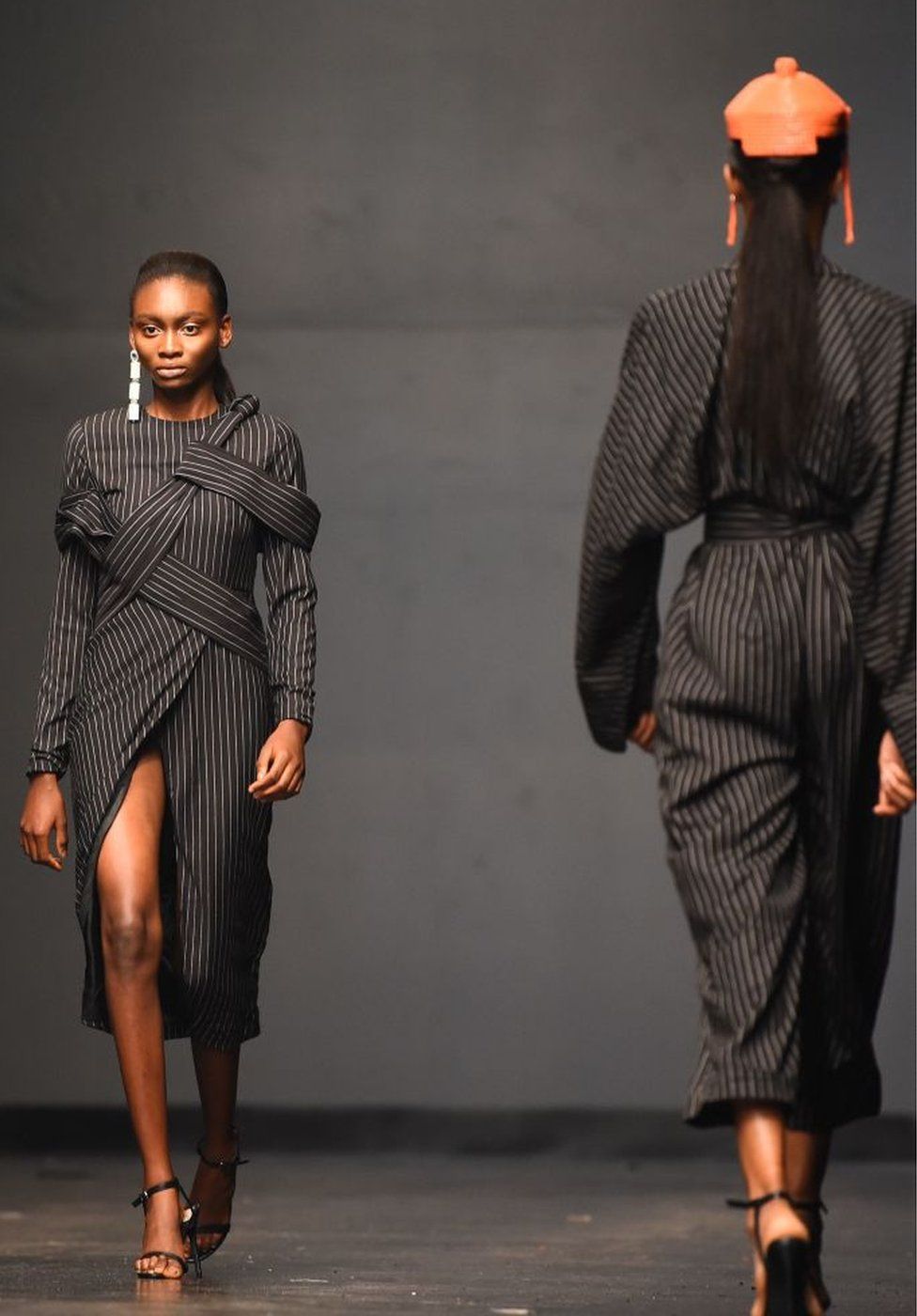 Designs by Fruche are modeled on the catwalk during Lagos Fashion Week.