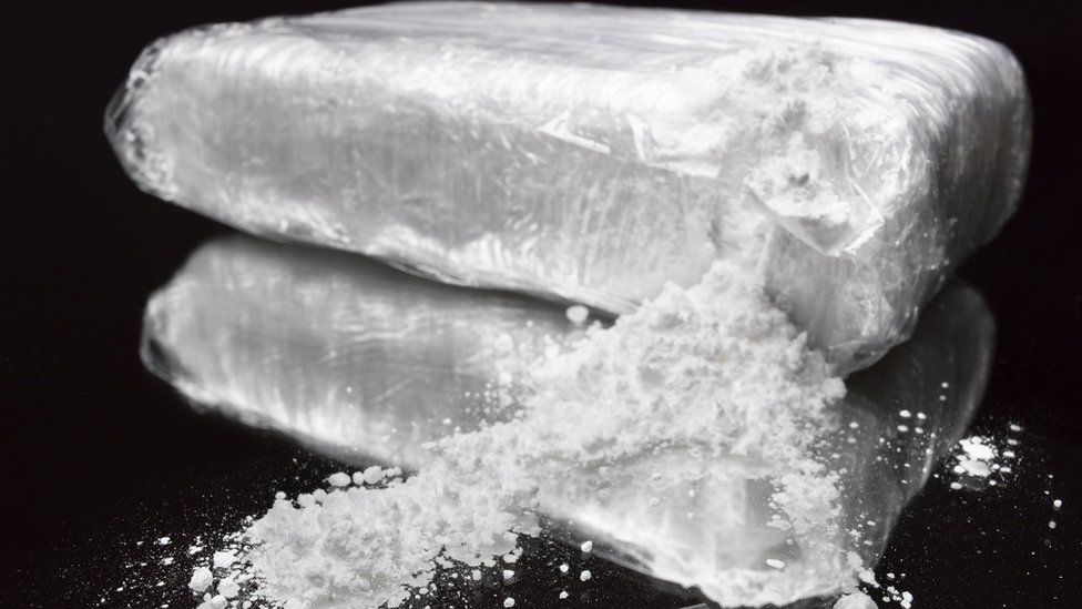 A bag of white powder split open (file photo)