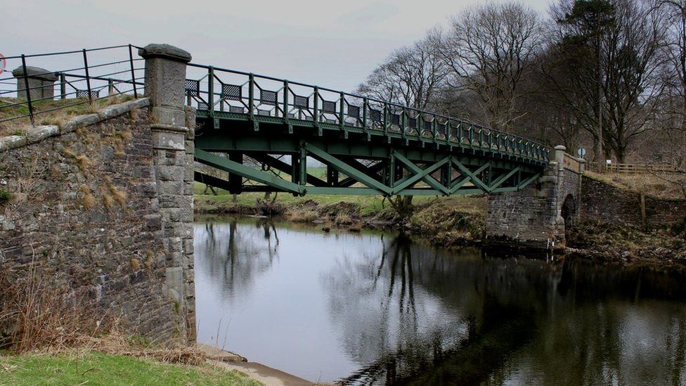 Rigmaden Bridge is a wrought iron structure that carries a minor road across the river