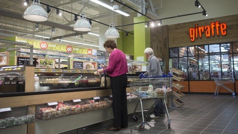 Shop and work, UK's Tesco gives up supermarket space for office area