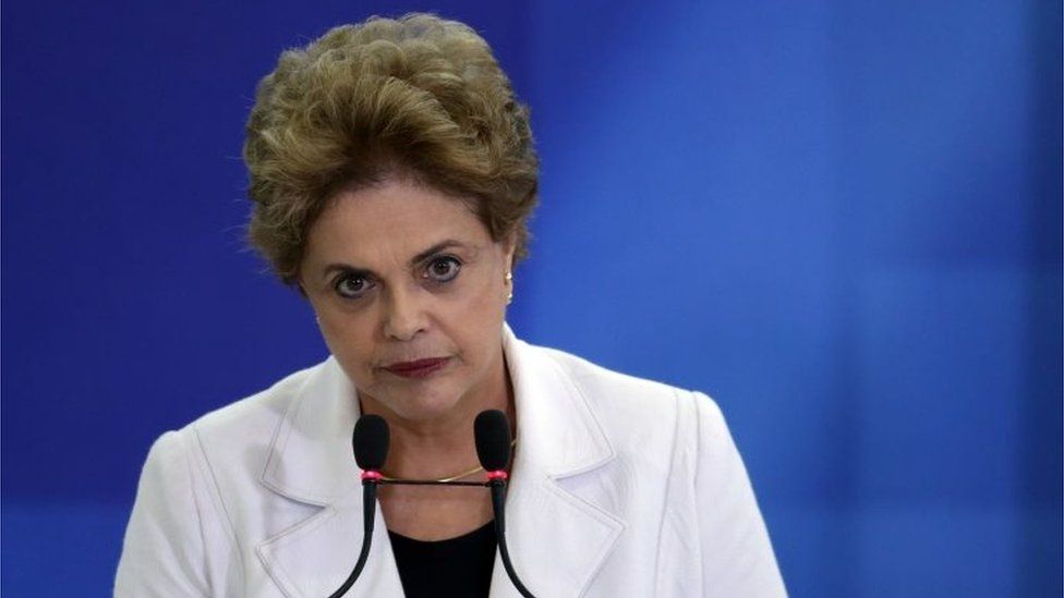 Brazil's President Dilma Rousseff pauses as she addresses teachers and students during a ceremony at Planalto presidential palace in Brasilia, Brazil, Tuesday, April 12, 2016.