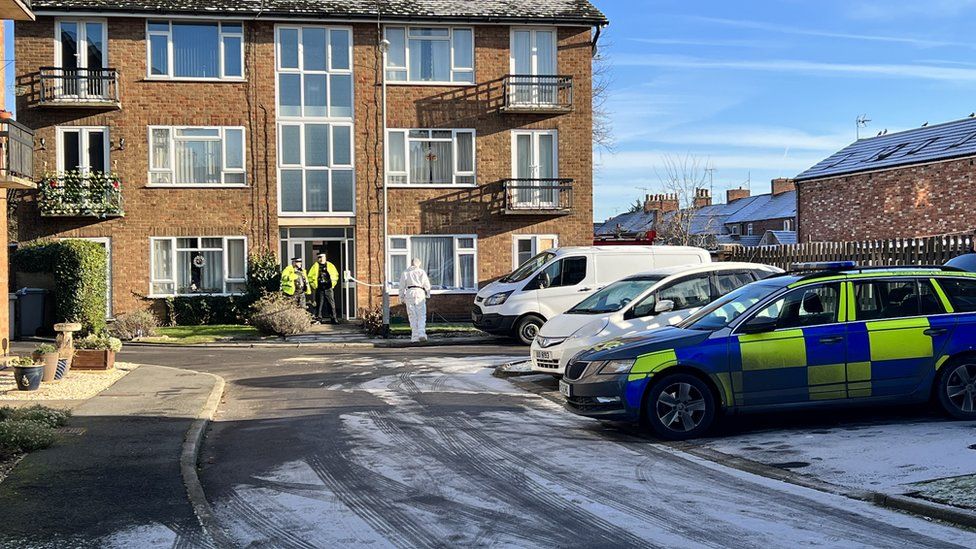 Police officers at Petherton Court in Kettering