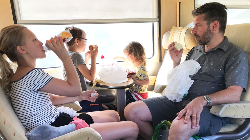 Anna Hamno Wickman's family on a train